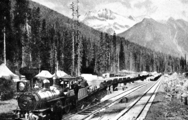 A TRAINLOAD OF TIMBER leaving a construction camp in Rogers Pass, Canadian Pacific Railway