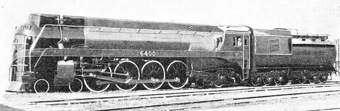 EIGHT COUPLED WHEELS and leading and trailing bogies give No. 6400 the 4-8-4 wheel arrangement