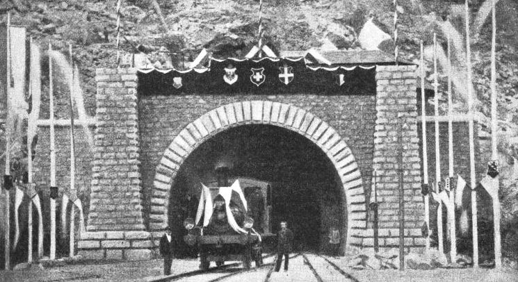 THE FIRST LOCOMOTIVE to pass through the St. Gotthard Tunnel
