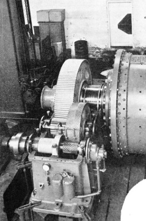 DOUBLE REDUCTION GEAR for transmitting the drive of a fast-running electric motor to a slow-running ball mill for grinding ore