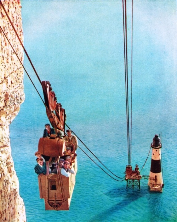 FROM CLIFF TOP TO THE LIGHTHOUSE, which was built 500 feet from the base of Beachy Head, Sussex, men and materials were transported by a cableway